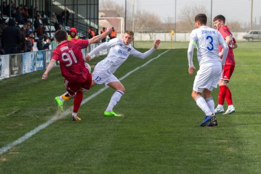 Odessa, Ukrayna-Mart 27, 2019: FC Balkanların First League maçı (Odessa)-FC Miner. Ukrayna 'nın ilk futbol ligi bölgesel ekipler oyunun gergin anları