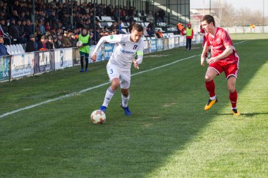 Odessa, Ukrayna-Mart 27, 2019: FC Balkanların First League maçı (Odessa)-FC Miner. Ukrayna 'nın ilk futbol ligi bölgesel ekipler oyunun gergin anları