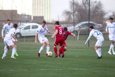 Odessa, Ukrayna-Mart 27, 2019: FC Balkanların First League maçı (Odessa)-FC Miner. Ukrayna 'nın ilk futbol ligi bölgesel ekipler oyunun gergin anları