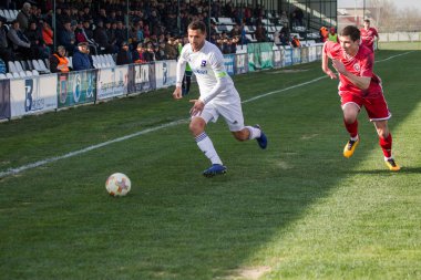 Odessa, Ukrayna-Mart 27, 2019: FC Balkanların First League maçı (Odessa)-FC Miner. Ukrayna 'nın ilk futbol ligi bölgesel ekipler oyunun gergin anları