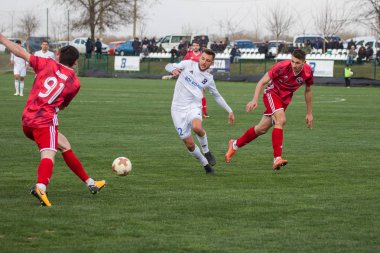 Odessa, Ukrayna-Mart 27, 2019: FC Balkanların First League maçı (Odessa)-FC Miner. Ukrayna 'nın ilk futbol ligi bölgesel ekipler oyunun gergin anları