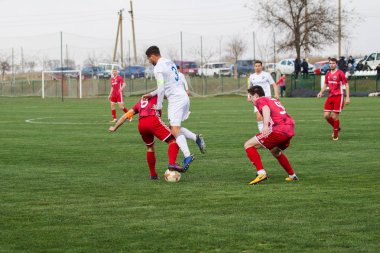 Odessa, Ukrayna-Mart 27, 2019: FC Balkanların First League maçı (Odessa)-FC Miner. Ukrayna 'nın ilk futbol ligi bölgesel ekipler oyunun gergin anları
