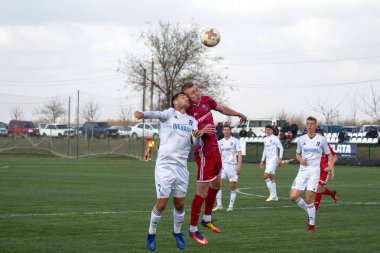 Odessa, Ukrayna-Mart 27, 2019: FC Balkanların First League maçı (Odessa)-FC Miner. Ukrayna 'nın ilk futbol ligi bölgesel ekipler oyunun gergin anları