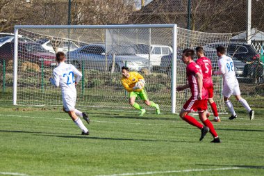 Odessa, Ukrayna-Mart 27, 2019: FC Balkanların First League maçı (Odessa)-FC Miner. Ukrayna 'nın ilk futbol ligi bölgesel ekipler oyunun gergin anları