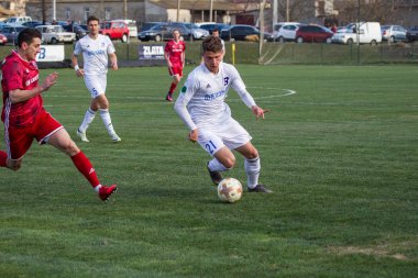 Odessa, Ukrayna-Mart 27, 2019: FC Balkanların First League maçı (Odessa)-FC Miner. Ukrayna 'nın ilk futbol ligi bölgesel ekipler oyunun gergin anları