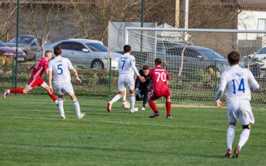 Odessa, Ukrayna-Mart 27, 2019: FC Balkanların First League maçı (Odessa)-FC Miner. Ukrayna 'nın ilk futbol ligi bölgesel ekipler oyunun gergin anları