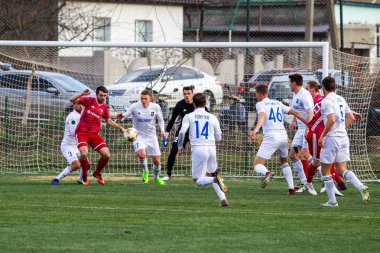 Odessa, Ukrayna-Mart 27, 2019: FC Balkanların First League maçı (Odessa)-FC Miner. Ukrayna 'nın ilk futbol ligi bölgesel ekipler oyunun gergin anları