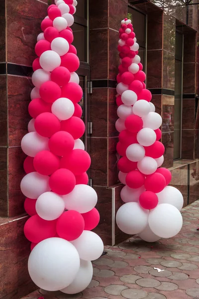 Making the entrance with colorful balloons during the celebration of a solemn event. Party or birthday banner with colorful balloons