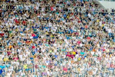Odak dışında, keskin spor arka plan değil - stadyumda seyirci. Maç sırasında futbol stadyumu tribünlerinde taraftarlar tribünlerde taraftarlar la Tribune. Futbol taraftarları ile standları