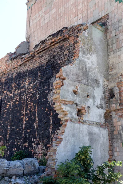 Ruined house. Remains of old houses. Apocalypse. Abandoned city. City of ghosts. Ruins of old historic houses destroyed by an earthquake and devastating operation of urban structures. Broken building