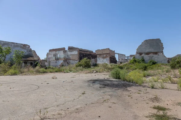 Ruined house. Remains of old houses. Apocalypse. Abandoned city. City of ghosts. Ruins of old historic houses destroyed by an earthquake and devastating operation of urban structures. Broken building