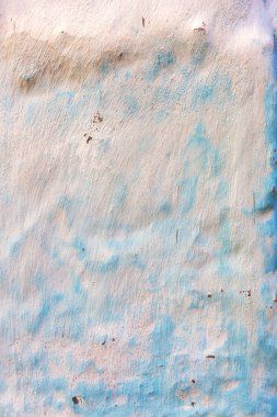 Arka plan beton duvar, yıpranma izleri, yıpranmış duvar eski boya yıpranmış boya. Boyalı beton yüzeyüzerinde eski boya kalıntıları. Grungy beton yüzey. Duvarda grafiti eski boya izleri
