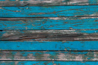 Çatlamış boya, arka plan ile eski eski eski eski eski ahşap tahta tahtalar. Büyük çatlaklar ve eski boya kalıntıları izleri ile arka plan eski ahşap