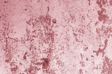 Şablon ve arka plan için güneş ışığındaki eski, dağınık taş ya da beton duvar dokusu. Arka plan olarak çatlamış beton duvar. Seçici odak eski çatlak sıva