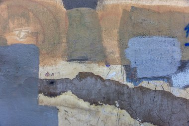 Yaratıcı arka plan için şehir duvarındaki fırça darbelerinin soyut arkaplanı. Güzel sokak sanatı grafitileri. Vandal, holiganlar duvarı boyadı. Şehir duvarına modaya uygun renklerin soyut yaratıcı çizimi