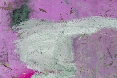 Yaratıcı arka plan için şehir duvarındaki fırça darbelerinin soyut arkaplanı. Güzel sokak sanatı grafitileri. Vandal, holiganlar duvarı boyadı. Şehir duvarına modaya uygun renklerin soyut yaratıcı çizimi