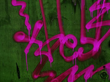Modern ikonik şehir kültürü - Grafiti yazısı. Soyut çizimlerle dekore edilmiş duvar boyası. Etiket grafitisinin ayrıntıları. Arka plan için parça. Modern ikonik şehir kültürü sokak gençliği
