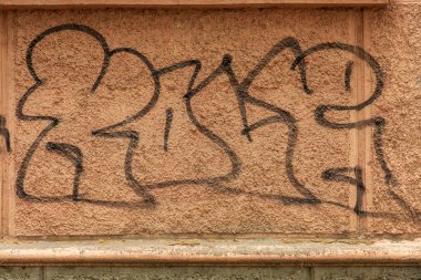 Modern ikonik şehir kültürü - Grafiti yazısı. Soyut çizimlerle dekore edilmiş duvar boyası. Etiket grafitisinin ayrıntıları. Arka plan için parça. Modern ikonik şehir kültürü sokak gençliği