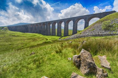 View of large Victorian viaduct in rural countryside scenery clipart