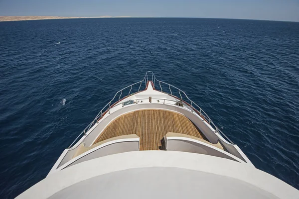 View over the bow over a large motor yacht — Stock Photo, Image