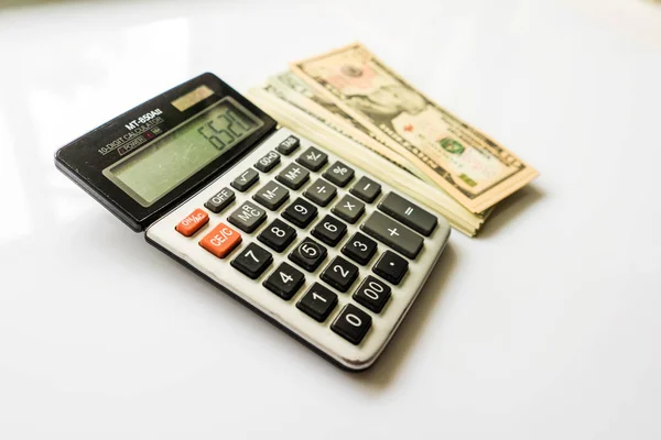 Close-up  Money and Calculator, American Dollar Banknotes — Stok Foto