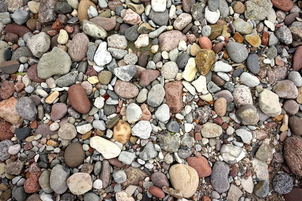 Astratto liscio ciottoli rotondi su una spiaggia — Foto Stock