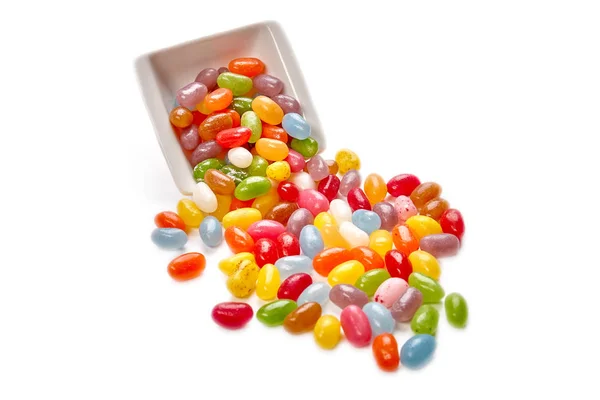 Coloridos caramelos en el plato Imagen de archivo