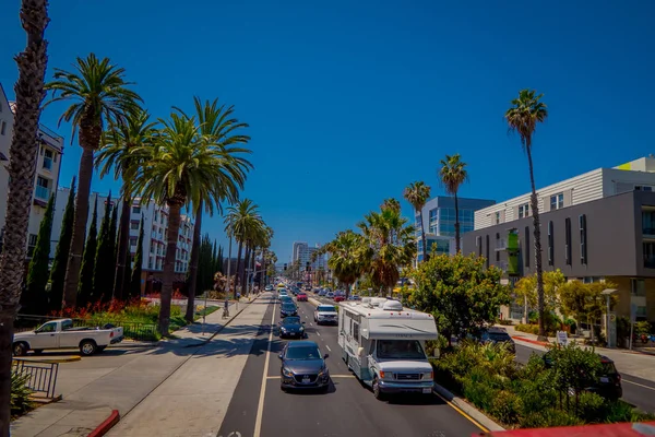 Los Angeles, California, USA, JUNE, 15, 2018: Outdoor view of cars in the traffic street in Santa monica avenue . The city is named after the Christian saint Monica — Stock Photo, Image