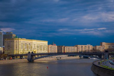 MOSCOW, RUSSIA- APRIL, 24, 2018: Panoramic view of Moscow and bridge over the Moskva River in conecting modern skyscrapers of Moscow-City. Landscape and cityscape of Moscow in cloudy sky clipart