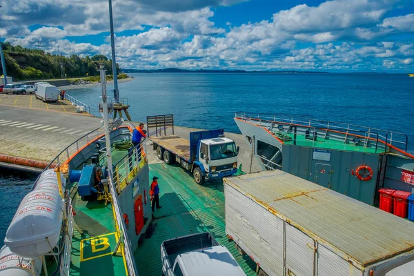CHILOE, CHILE - SEPTEMBER, 27, 2018: Above view of cars inside of ferry and passengers for crossing from the Chilean mainland to the Island of Chiloe — Stock Photo, Image