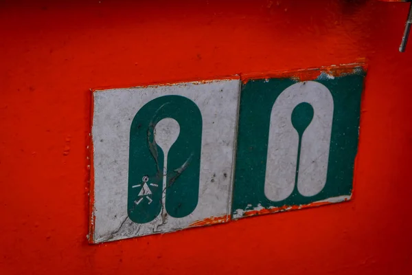 Close up of image of lifesaver instruction in a metallic background in the mainland of Chile — Stock Photo, Image