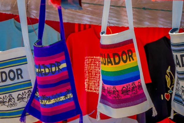 OTAVALO, ECUADOR, NOVEMBER 06, 2018: Outdoor view of typical andean bags sold on the handicrafts market of Otavalo — Stock Photo, Image