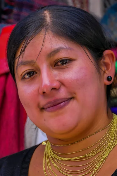 OTAVALO, ECUADOR, NOVEMBER 06, 2018: Portrait of indigenous woman wearing andean traditional clothing and necklace posing for camera — Stock Photo, Image