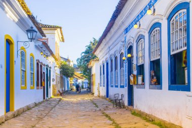 Street of historical center in Paraty, Rio de Janeiro, Brazil. Paraty is a preserved Portuguese colonial and Brazilian Imperial municipality. clipart