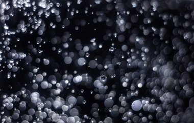 Noellerin soyut ve ışıltılı arka planlı bokeh ışığı .