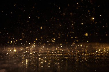 Noellerin soyut ve ışıltılı arka planlı bokeh ışığı .