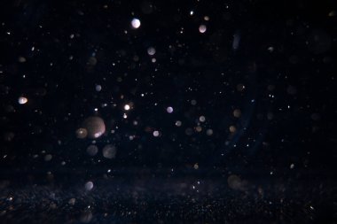 Noellerin soyut ve ışıltılı arka planlı bokeh ışığı .