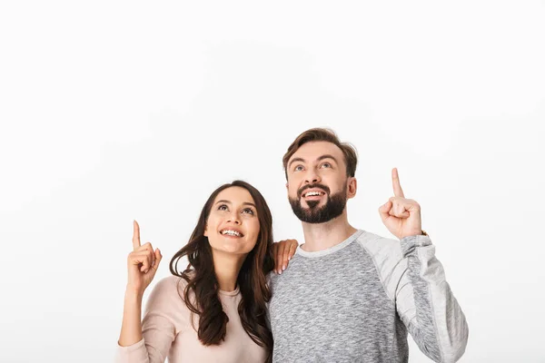 Image Cheerful Young Loving Couple Isolated White Wall Background Looking — Stock Photo, Image