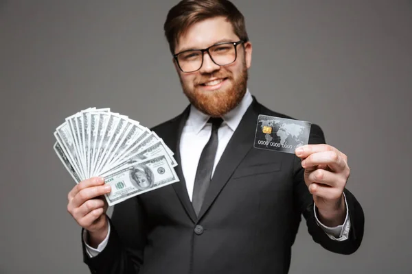 Portrait Confident Young Businessman Holding Money Banknotes Credit Card Isolated — Stock Photo, Image