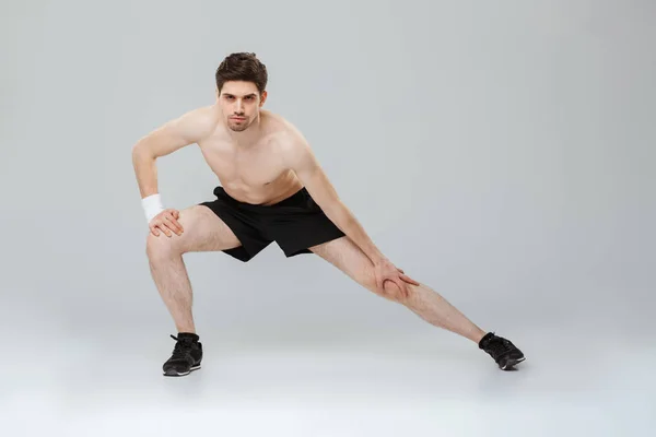 Full Length Portrait Confident Young Half Naked Sportsman Doing Stretching — Stock Photo, Image