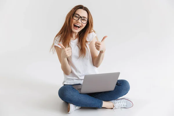 Happy Woman Shirt Eyeglasses Sitting Floor Laptop Computer While Showing — Stock Photo, Image