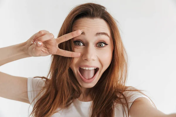 Joyful Woman Casual Clothes Making Selfie Showing Peace Gesture While — Stock Photo, Image