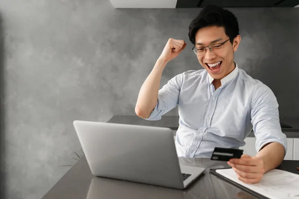 Portrait Happy Young Asian Man Holding Plastic Credit Card While — Stock Photo, Image