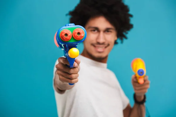 Close Portrait Happy Young African Man Playing Two Water Guns — Stock Photo, Image