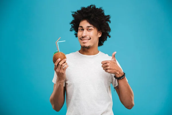 Portrait Confident Young African Man Holding Tropical Cocktail Showing Thumbs — Stock Photo, Image