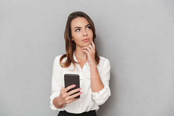 Portrait Pensive Young Business Woman Holding Mobile Phone Looking Away — Stock Photo, Image