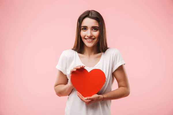Portrait Happy Young Woman Holding Red Heart Isolated Pink Background — Stock Photo, Image