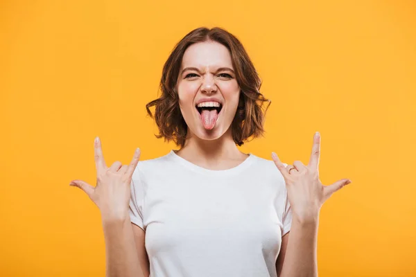 Imagem Jovem Mulher Emocional Isolado Sobre Fundo Amarelo Mostrando Pedra — Fotografia de Stock