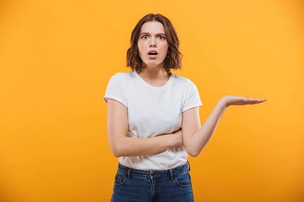 Image Displeased Young Lady Standing Isolated Yellow Background Looking Camera — Stock Photo, Image