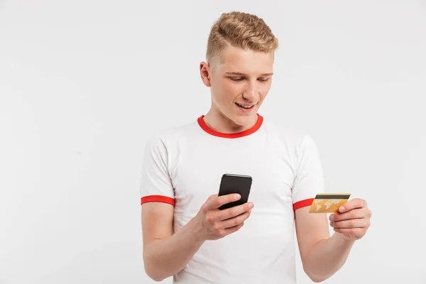 Portrait Smiling Teenage Boy Holding Mobile Phone Credit Card Isolated — Stock Photo, Image